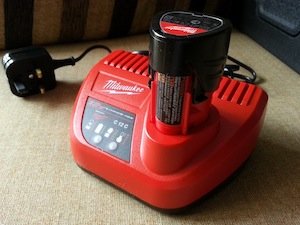 Milwaukee battery charger and REDLITHIUM-ION battery