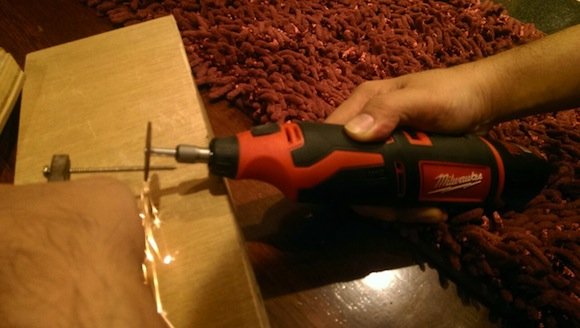 Milwaukee Rotary Tool cutting a screw