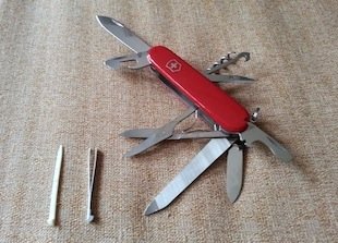 collection of victorinox swiss army knives