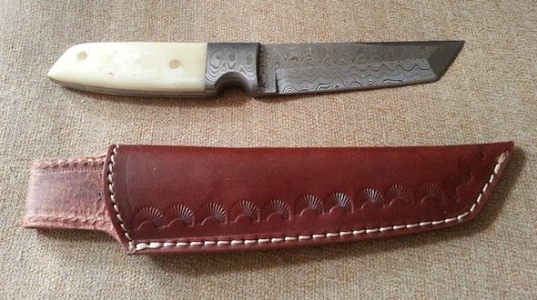 collection of fixed blade knives