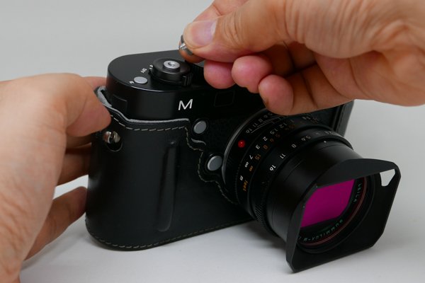 prevent soft shutter release button from falling off