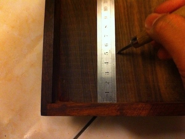 14. Measure with a steel ruler and mark 50 mm from one side using an awl...