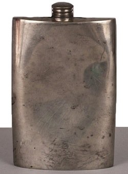 A squashed hip flask sold at an online auction site